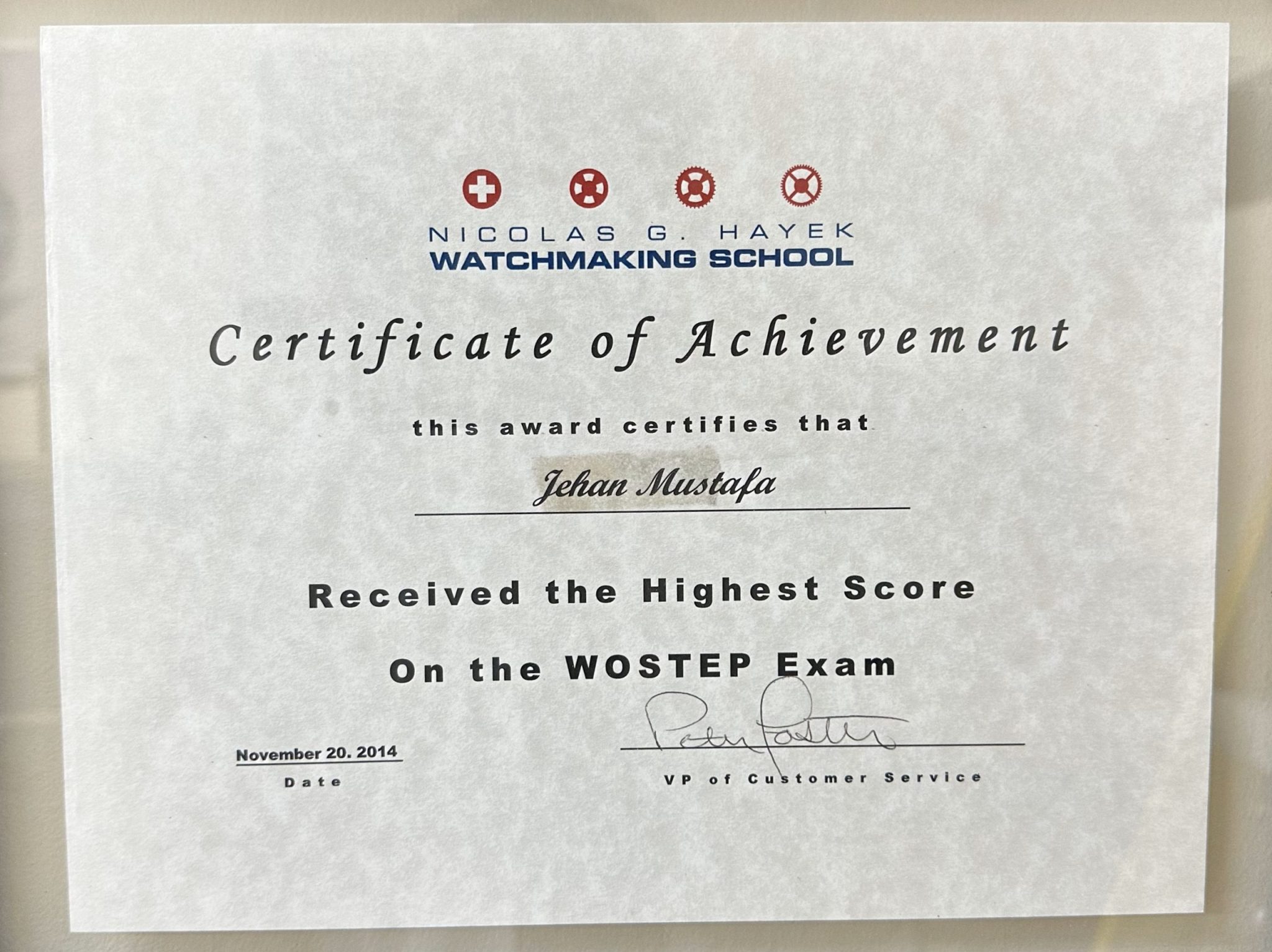 Nicolas G. Hayek Watchmaking School certificate recognizing Jehan Mustafa for the highest score on the WOSTEP exam