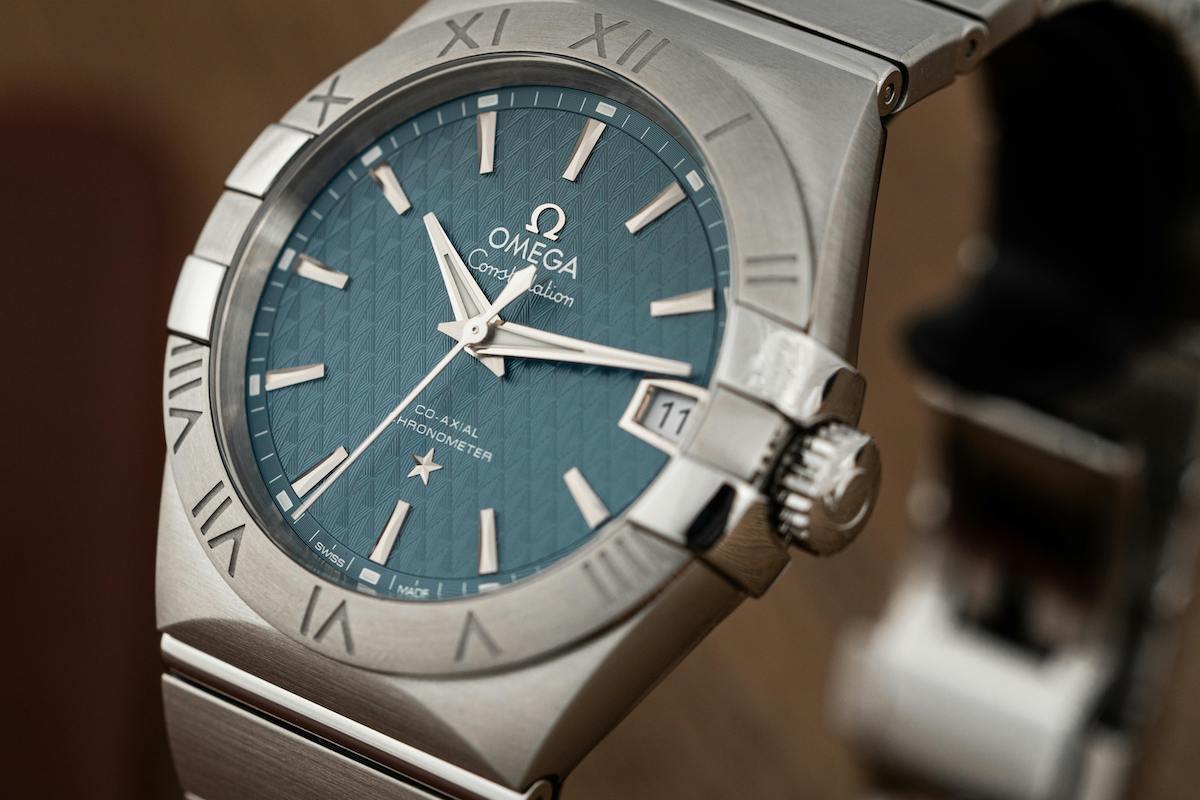Close-up of an Omega Constellation watch on a stainless-steel bracelet